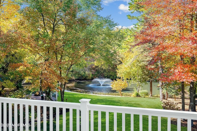 view of yard with a water view