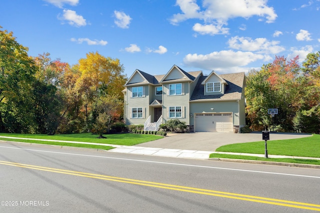 view of front facade with a garage, driveway, and a front lawn