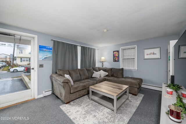 carpeted living area featuring a baseboard radiator