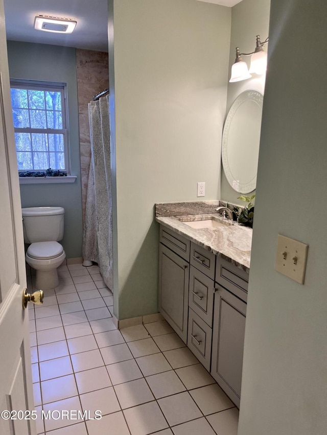 full bath with vanity, a shower with curtain, visible vents, tile patterned flooring, and toilet