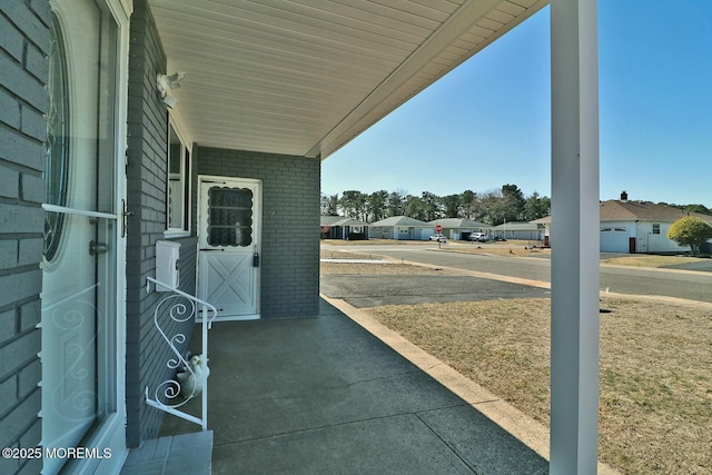 view of patio with a residential view