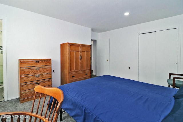 bedroom with dark colored carpet and recessed lighting