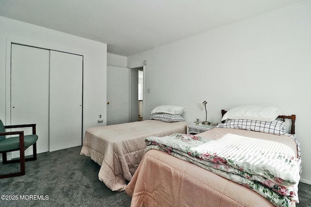 bedroom featuring a closet and carpet