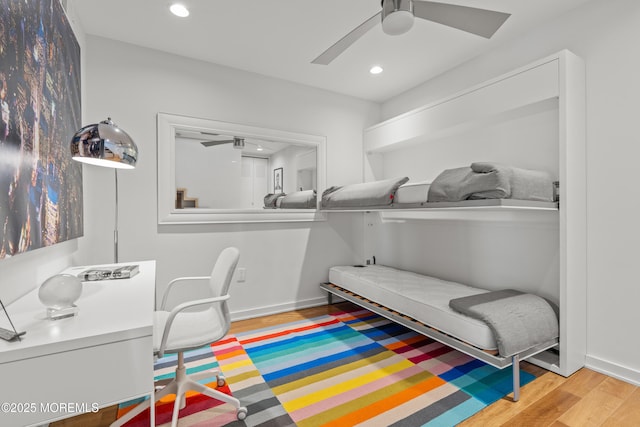 bedroom with recessed lighting, baseboards, wood finished floors, and ceiling fan