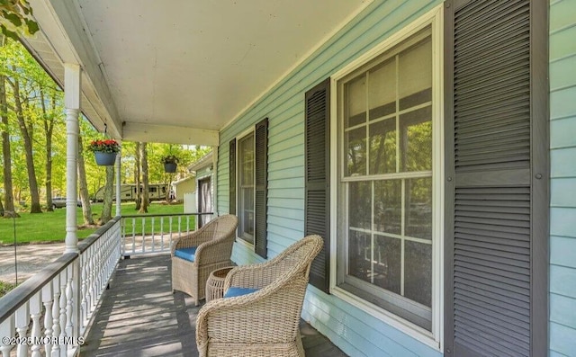 deck featuring covered porch