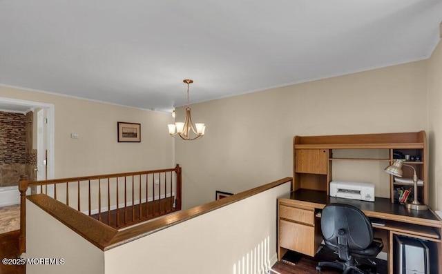 office space with a notable chandelier, dark wood-style floors, and ornamental molding