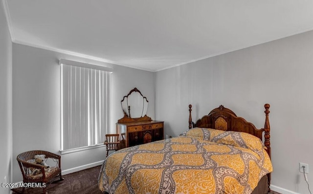 bedroom featuring dark colored carpet, baseboards, and crown molding