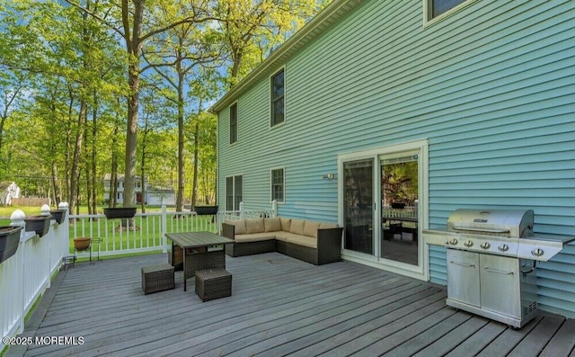 wooden deck featuring an outdoor living space