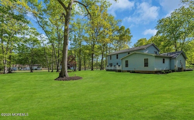 view of yard featuring central AC unit