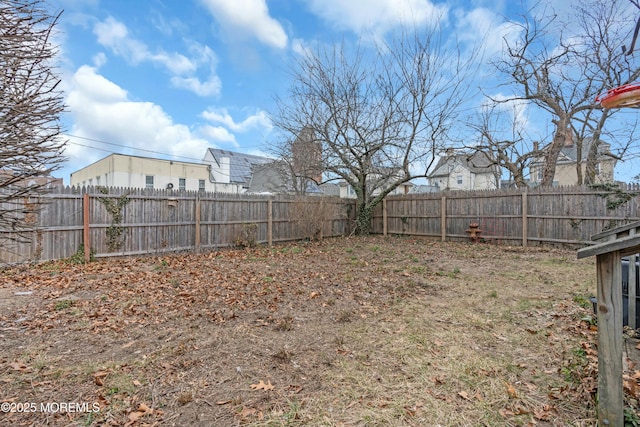 view of yard featuring a fenced backyard