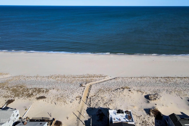 property view of water with a beach view