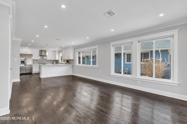 unfurnished living room with visible vents, baseboards, crown molding, and dark wood-type flooring