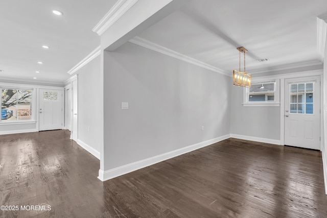 entryway with dark wood finished floors, visible vents, and baseboards