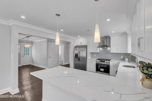 kitchen with backsplash, ornamental molding, stainless steel appliances, wall chimney exhaust hood, and a sink