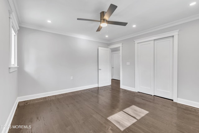 unfurnished bedroom featuring dark wood-style flooring, recessed lighting, baseboards, and ornamental molding