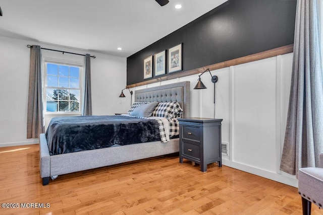 bedroom with recessed lighting, visible vents, baseboards, and light wood-style flooring