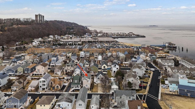 aerial view featuring a residential view and a water view