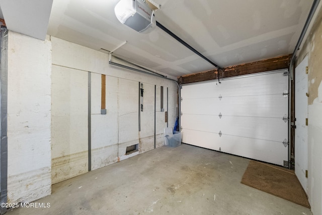 garage featuring a garage door opener