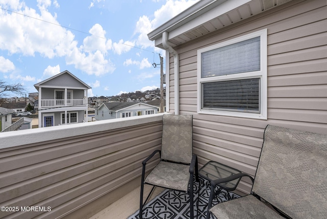 balcony featuring a residential view