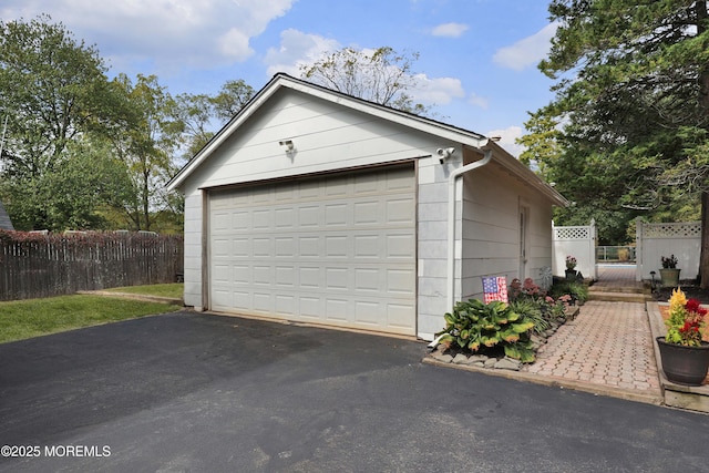 garage featuring fence