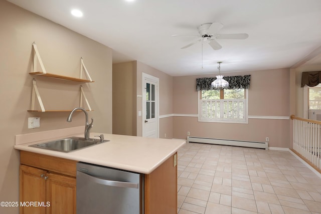 kitchen with dishwasher, light countertops, a baseboard heating unit, and a sink