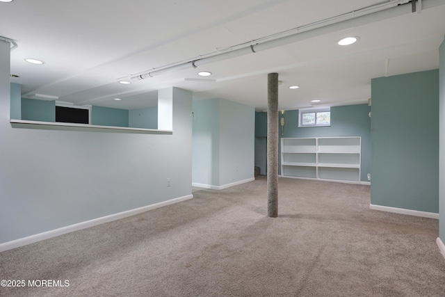 basement featuring recessed lighting, baseboards, and carpet floors