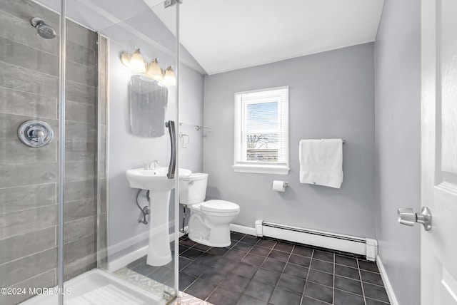 bathroom featuring tile patterned flooring, a shower stall, toilet, and a baseboard radiator