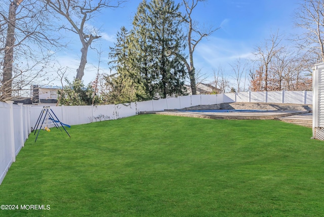 view of yard featuring a fenced backyard