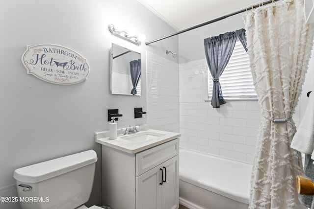 full bathroom featuring toilet, vanity, and shower / bath combination with curtain