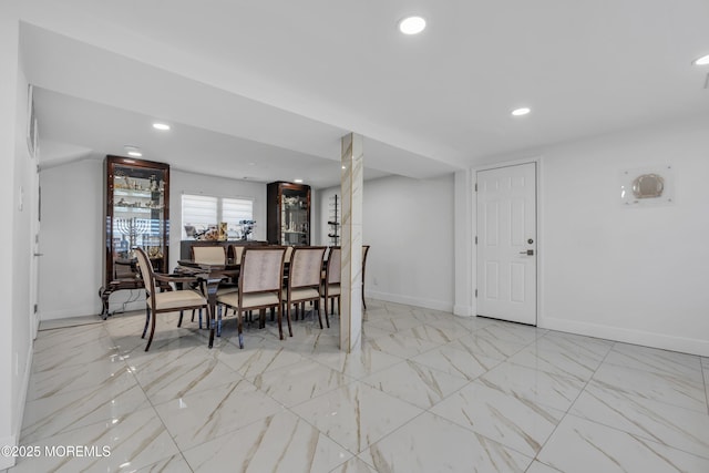 dining space featuring recessed lighting and baseboards