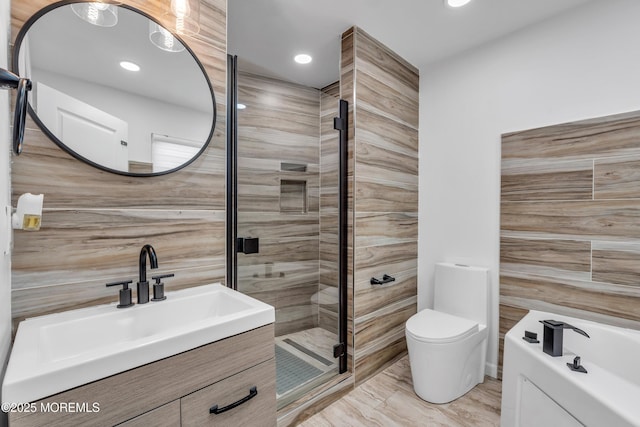 full bathroom with a shower stall, toilet, recessed lighting, a bath, and vanity