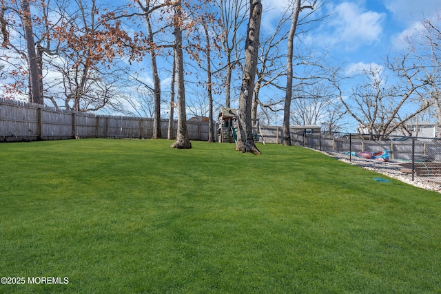 view of yard featuring a fenced backyard