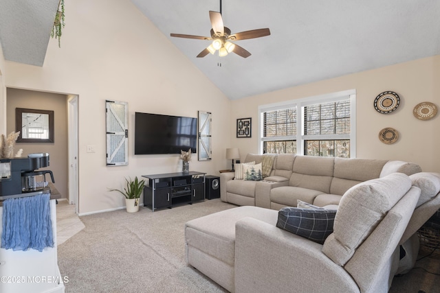 carpeted living room with baseboards, high vaulted ceiling, and ceiling fan