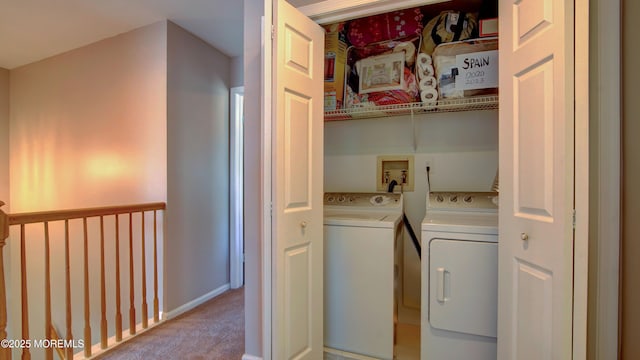 laundry room with laundry area, carpet, baseboards, and washer and clothes dryer