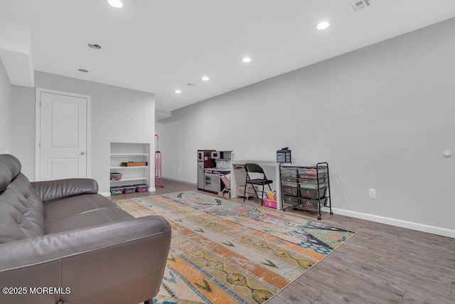 1158 Idalia Ave, Lakewood, NJ 08701 - living room with recessed lighting, baseboards, and wood finished floors