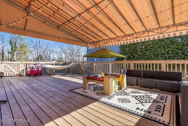 1158 Idalia Ave, Lakewood, NJ 08701 - wooden terrace with an outdoor living space