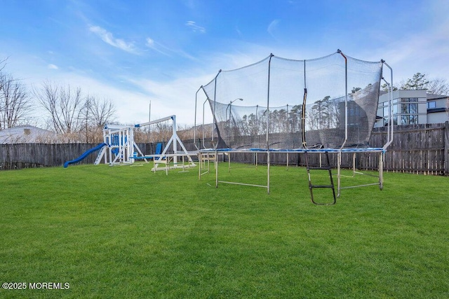 1158 Idalia Ave, Lakewood, NJ 08701 - view of yard featuring a playground, a trampoline, and fence