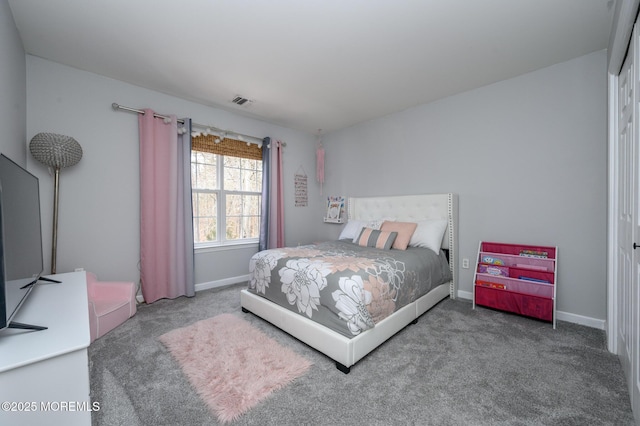 bedroom with visible vents, baseboards, and carpet