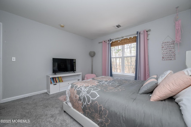 bedroom with carpet flooring, baseboards, and visible vents