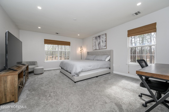 bedroom featuring visible vents, baseboards, and carpet flooring