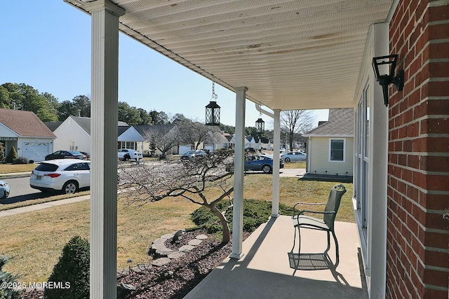 view of patio / terrace with a residential view