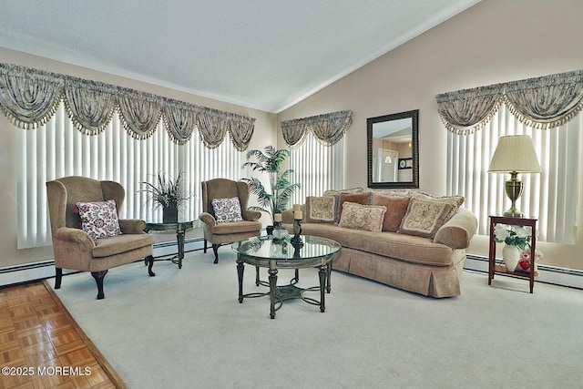 living area with lofted ceiling and a baseboard radiator