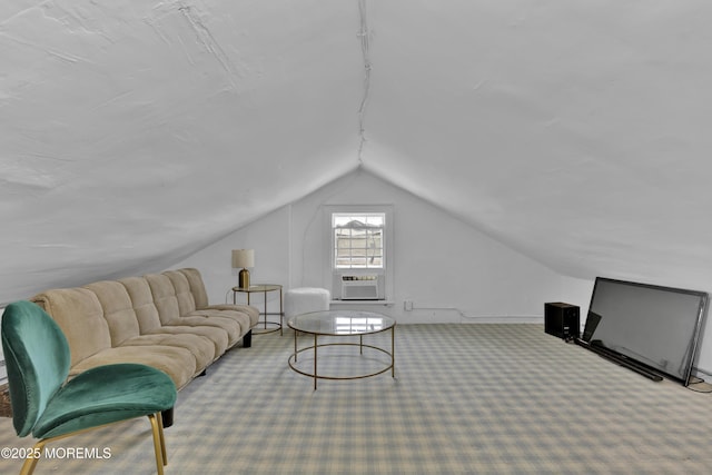 interior space with cooling unit, lofted ceiling, and carpet floors