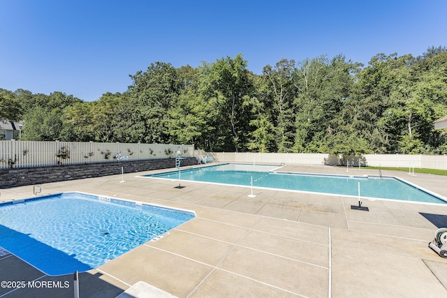 view of pool featuring fence and a fenced in pool