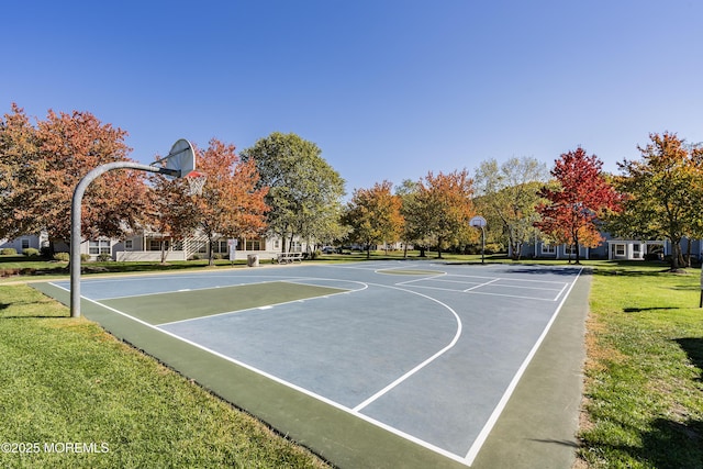 view of sport court with community basketball court and a yard