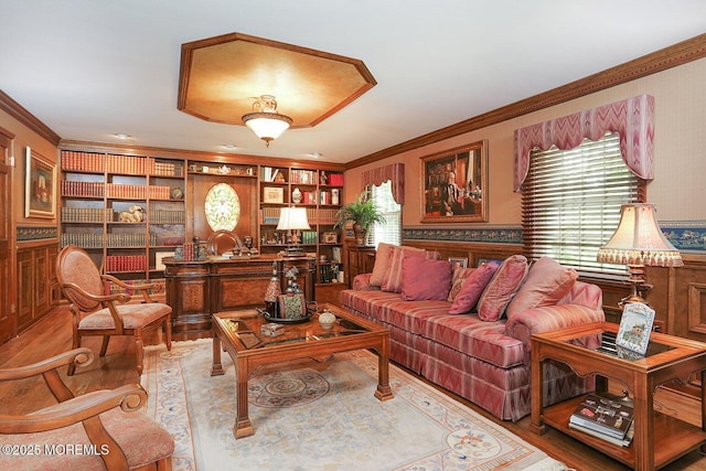 living room with ornamental molding