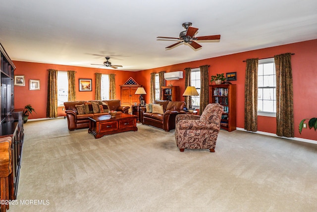 carpeted living room featuring ceiling fan, a wall mounted air conditioner, and baseboards