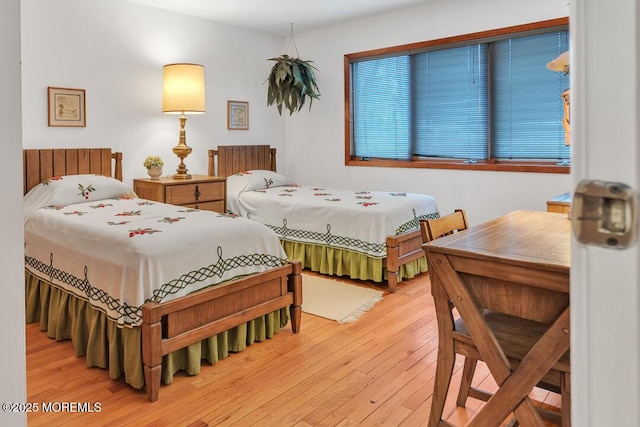 bedroom featuring hardwood / wood-style floors