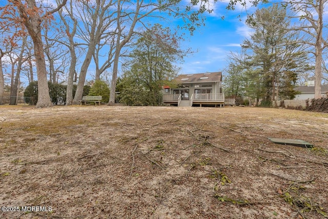 view of yard featuring a deck