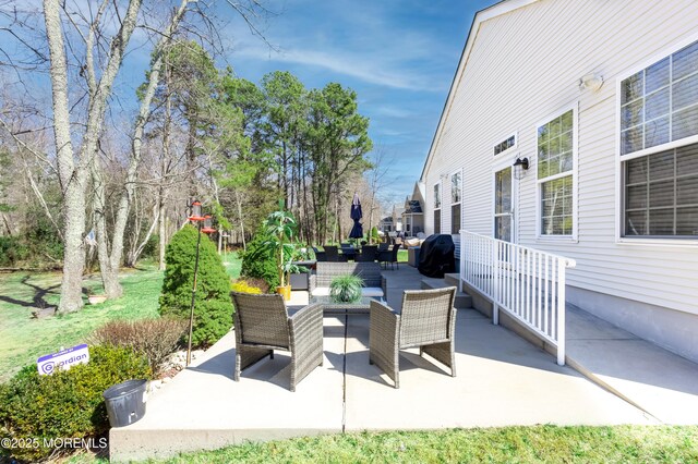 view of patio / terrace featuring grilling area and outdoor lounge area